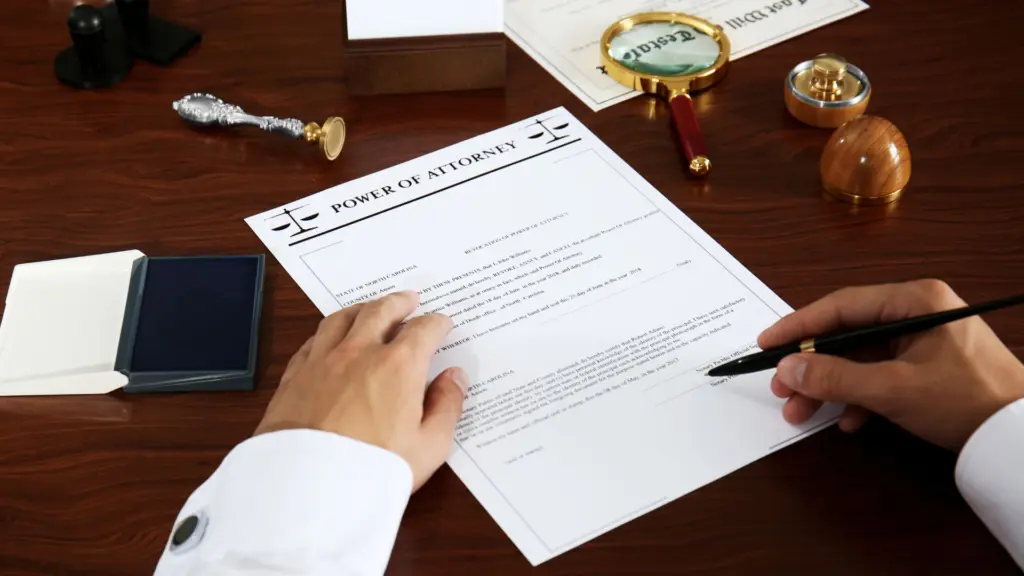 A person signing a legal document.