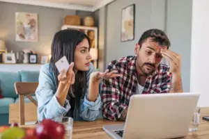 A couple arguing about what kind of lawyer they should hire.